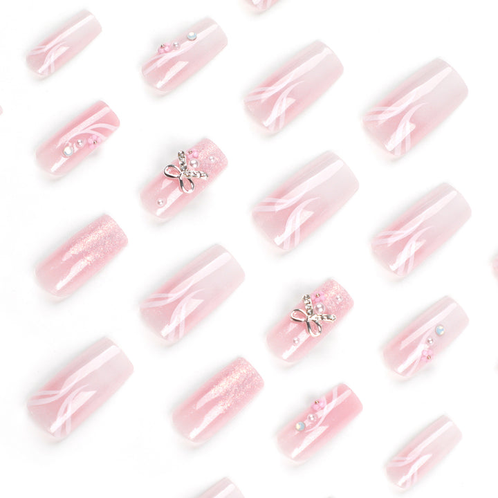 Artistic acrylic nails with elegant jewelry accents Bowlift