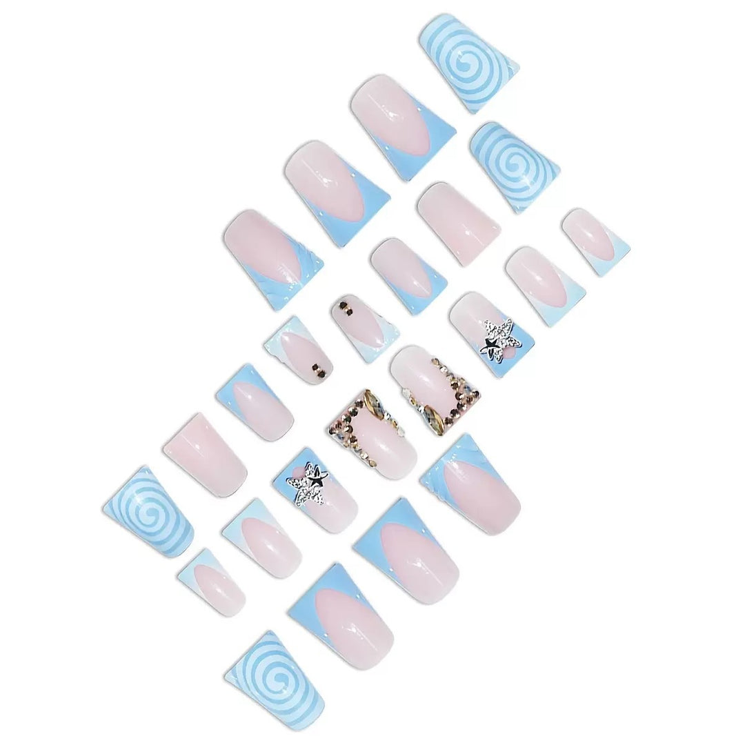 Artistic Long Press-On Nail Design with 3D Star Accents Bowlift