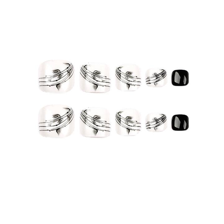 Artful toenail art in elegant black and white design Bowlift