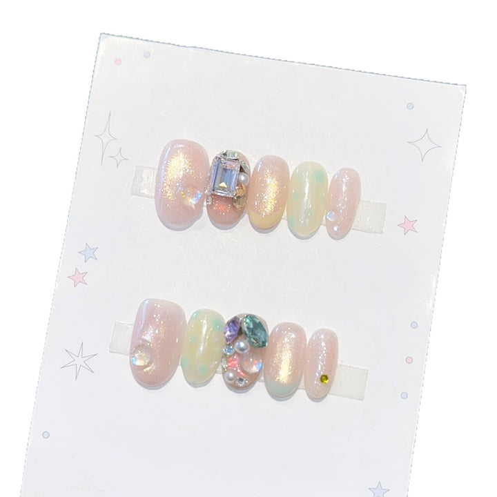 Artificial nails with shimmering effects and crystal accents Bowlift