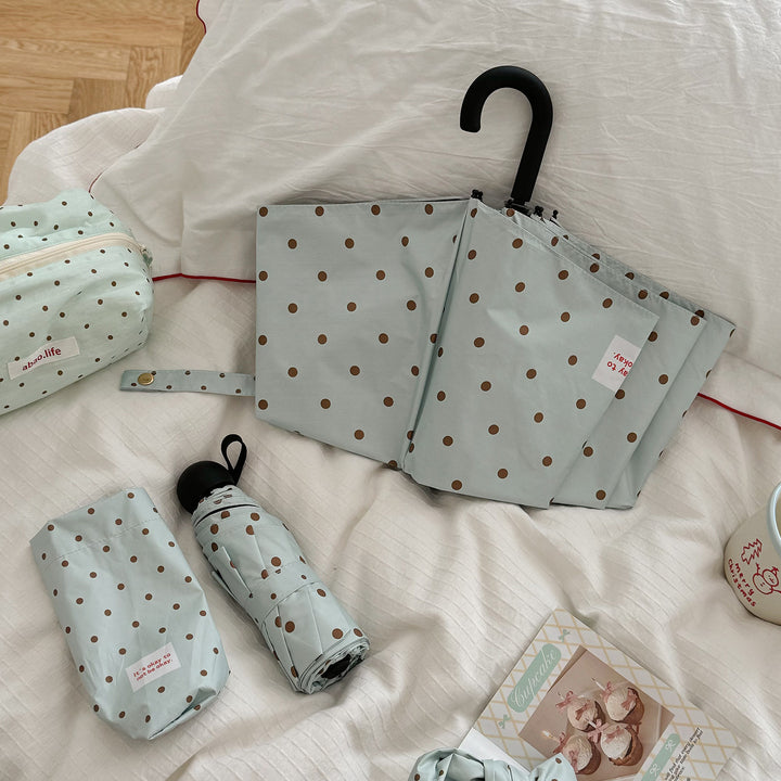 Women's Folding Umbrella with Practical Button Mechanism and Stylish Polka Dot Design Bowlift