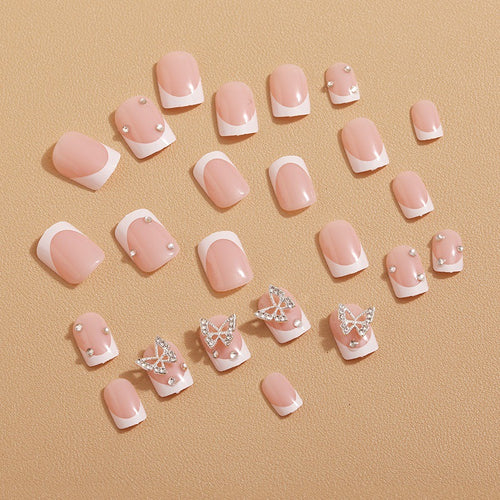Artificial nails with elegant butterfly embellishments Bowlift