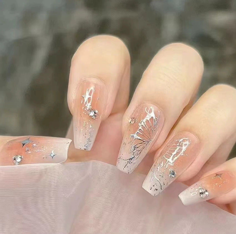 Elegant nail design with pearl embellishment Bowlift