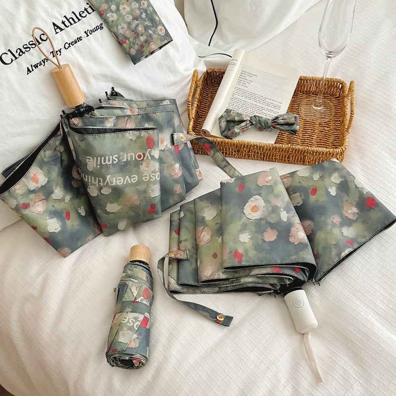 Ladies Folding Umbrella with Floral Design Bowlift