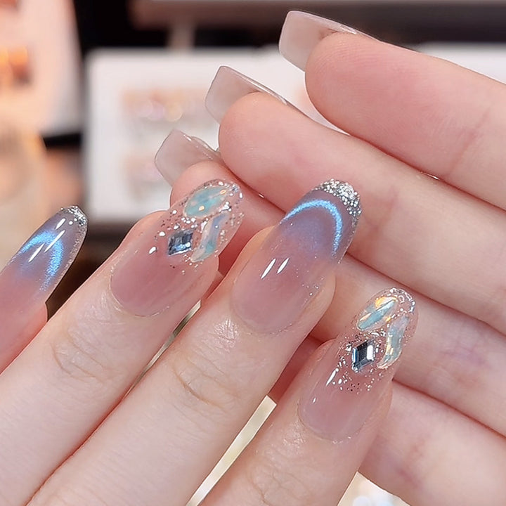 Artificial nail set with sparkling glitter accents Bowlift