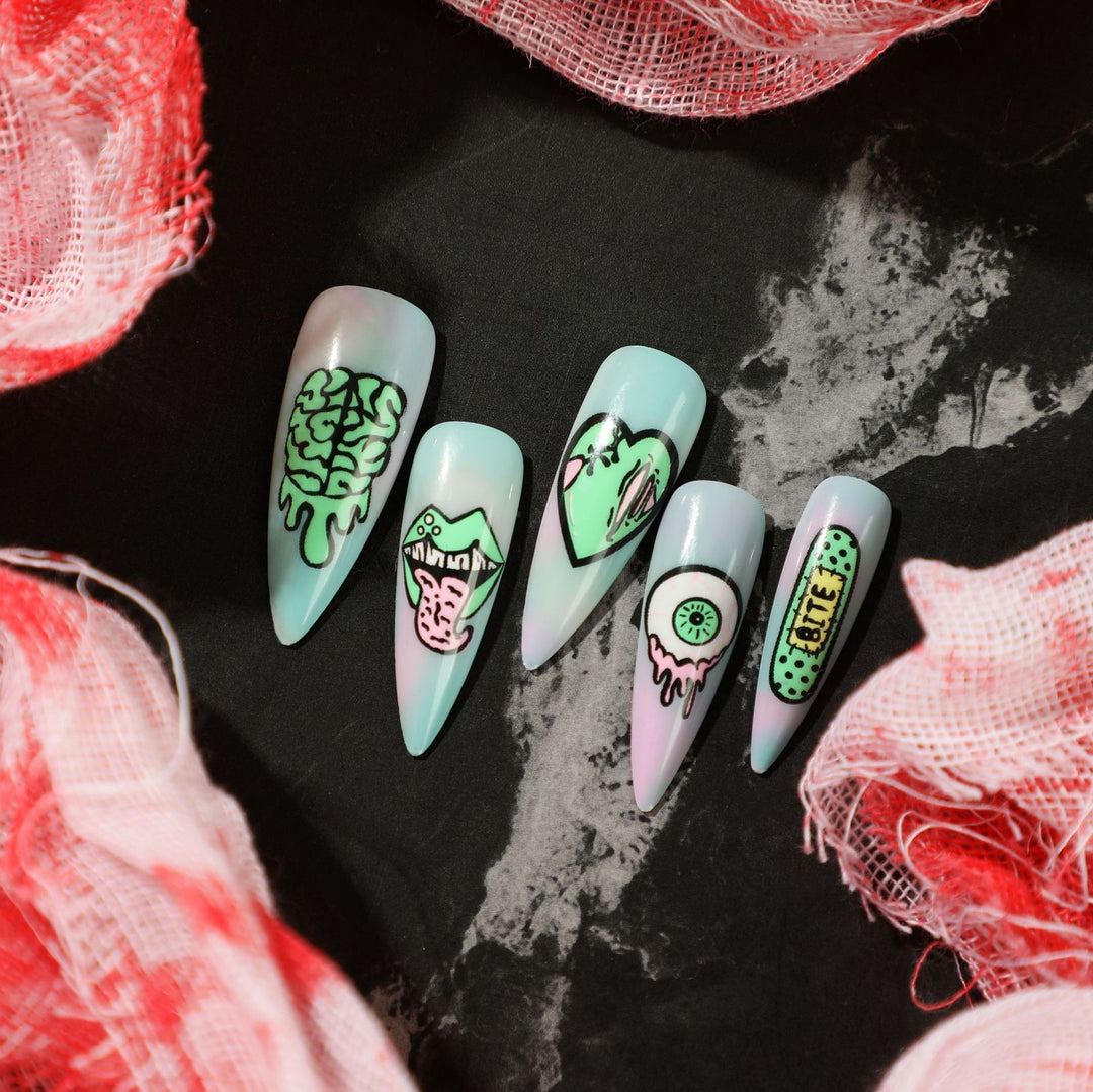 Artistic stiletto nails with creative designs and intricate detailing Bowlift