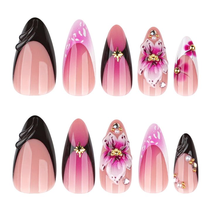 Artful stiletto nails with blooming design and glitter accents Bowlift
