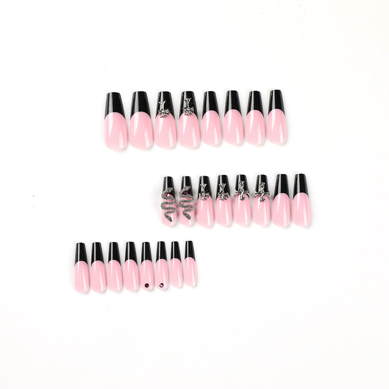 Artful stiletto nails with glitter accents and creative design Bowlift