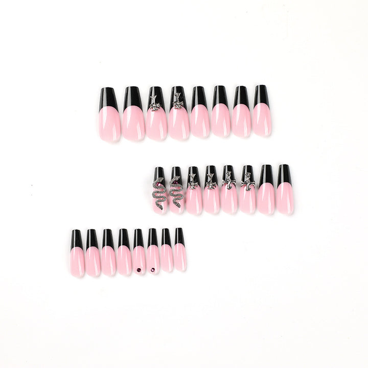 Artful stiletto nails with glitter accents and creative design Bowlift