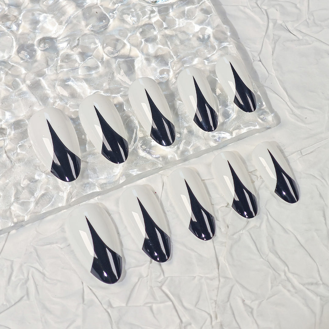 Trendy Stiletto Press-On Nails with Artistic Black and White Design Bowlift