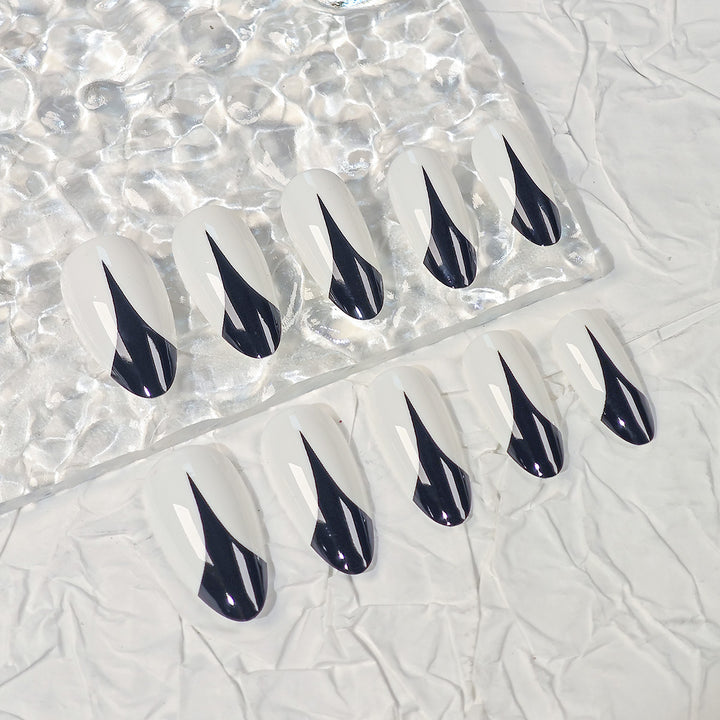 Trendy Stiletto Press-On Nails with Artistic Black and White Design Bowlift