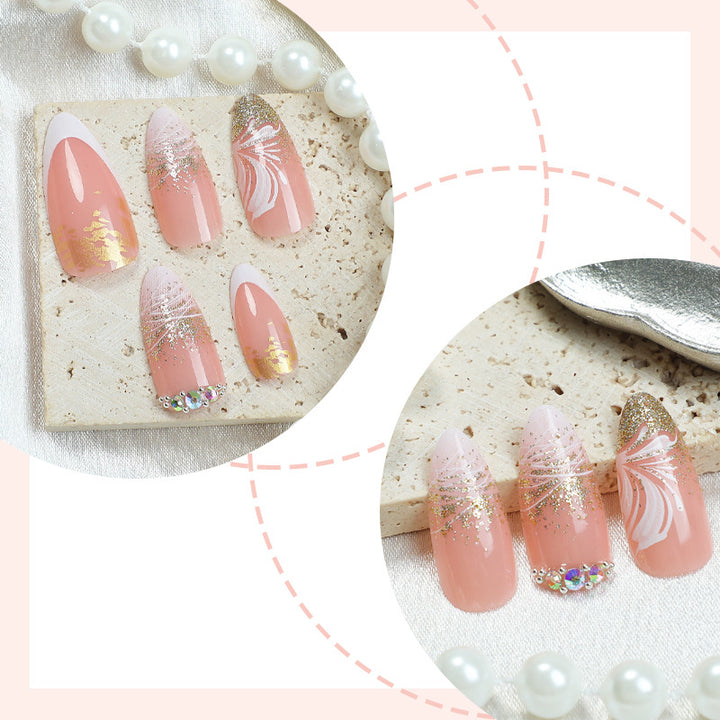 Artificial nail set with glamorous floral and glitter decorations Bowlift