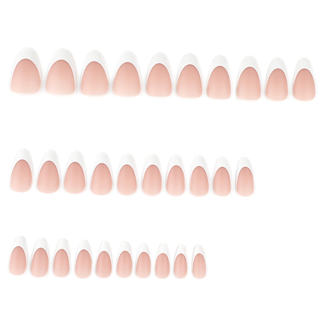 Artistic stiletto nails with elegant French design Bowlift