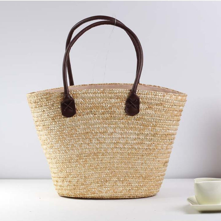 Braided beach bag with colorful embroidery pattern Bowlift