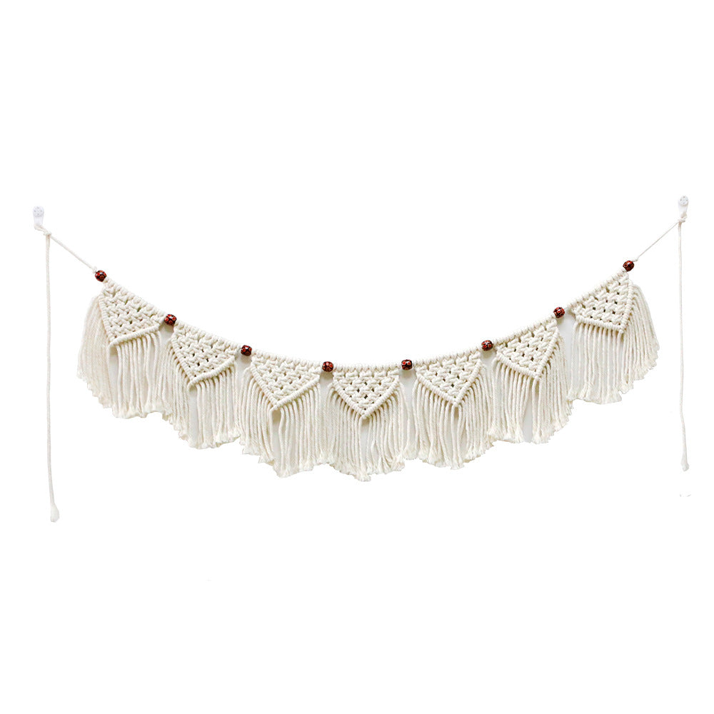 Decorative macrame wall hanging with ornate fringes