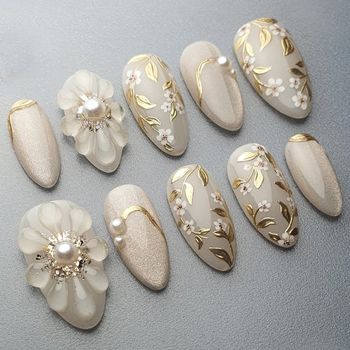 Artificial nail set with elegant flower and pearl decorations Bowlift