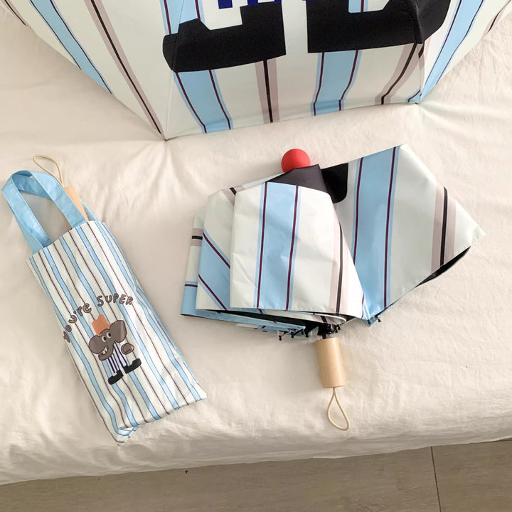 Ladies elegant folding umbrella with ergonomic wooden handle and protective carrying case Bowlift