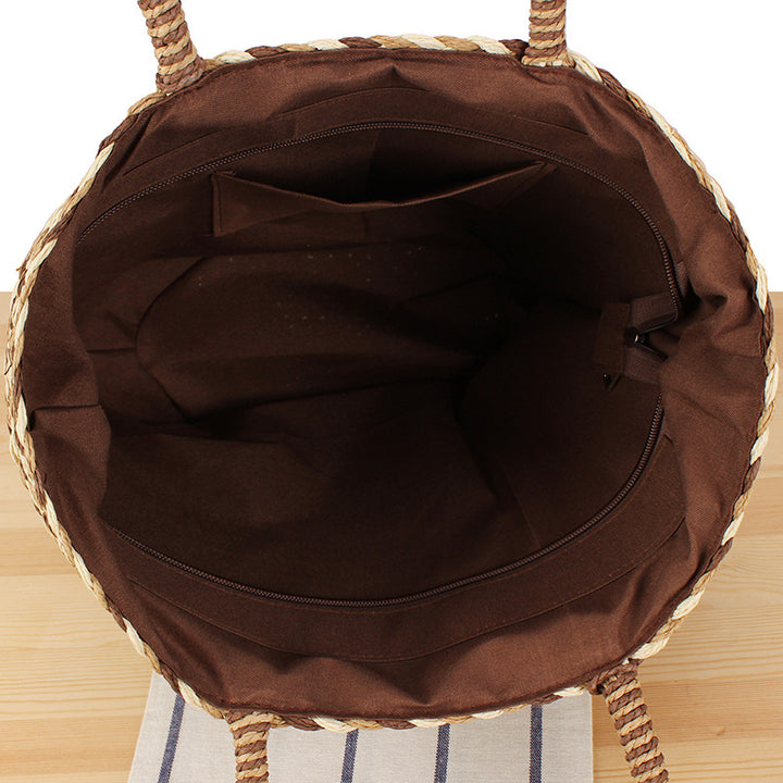 Fashionable basket bag with decorative pompons Bowlift