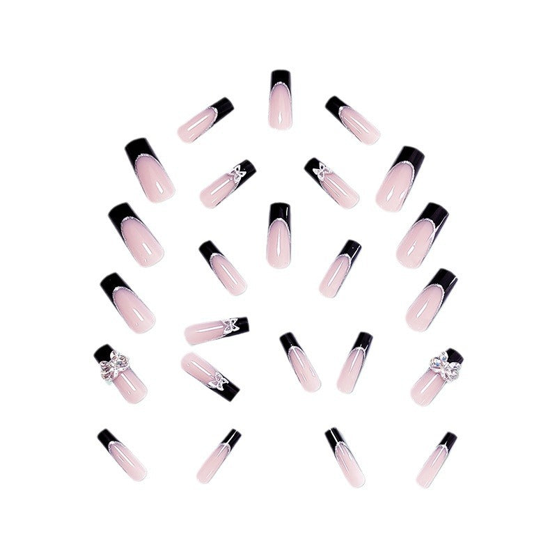 Glamorous artificial nails with rhinestone and butterfly elements Bowlift