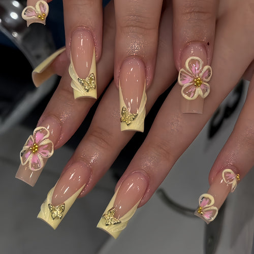 Decorative Nail Enhancements with Floral Accents Bowlift