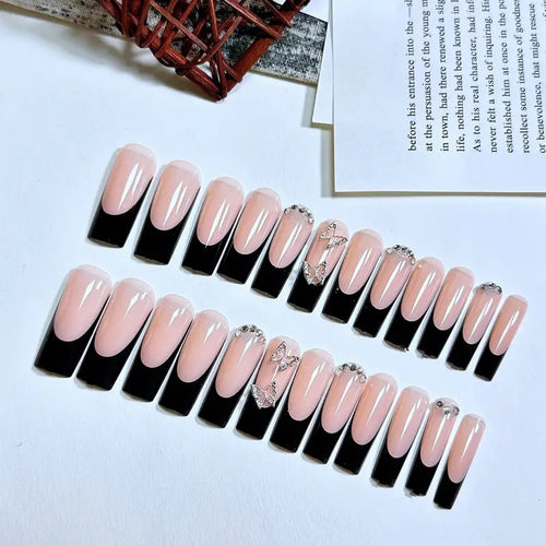 Trendy artificial nails with delicate rhinestone and butterfly accents Bowlift