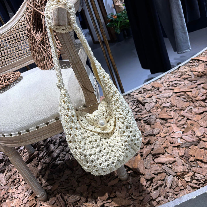 Hand-knotted shoulder bag with bead closure Bowlift