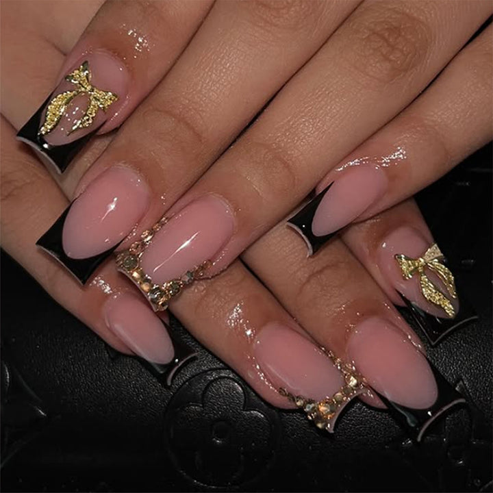 Artificial nail set with elegant gold decoration and stylish black Bowlift