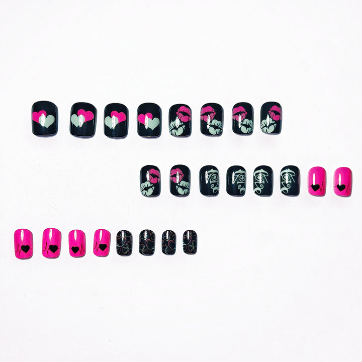 Acrylic nail design with hearts and kiss motifs Bowlift