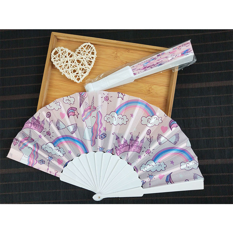 Women folding hand fan with shimmering scale pattern Bowlift