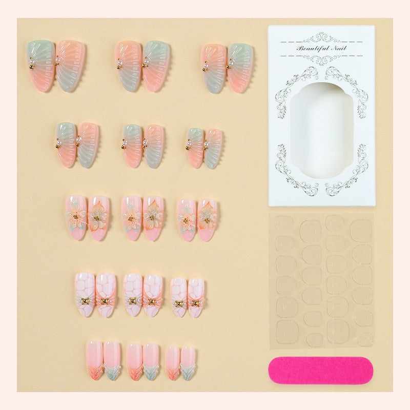 Artificial nail set with glamorous flower and glitter details Bowlift