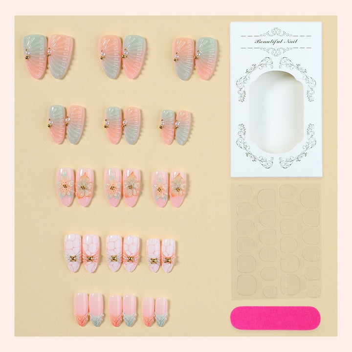 Artificial nail set with glamorous flower and glitter details Bowlift