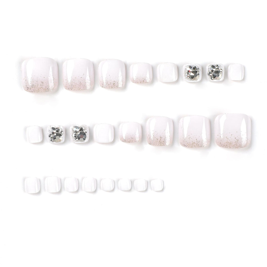 Artful toenail design with sparkling embellishments Bowlift
