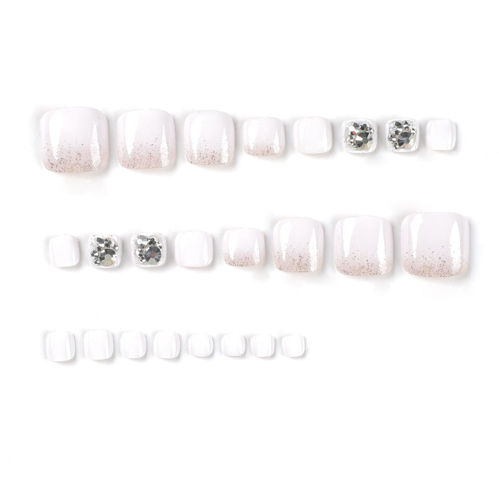 Artful toenail design with sparkling embellishments Bowlift