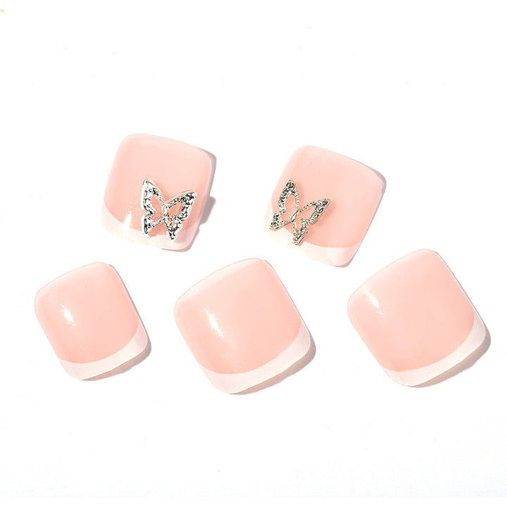 Artificial nail set with delicate decorations and glitter designs Bowlift