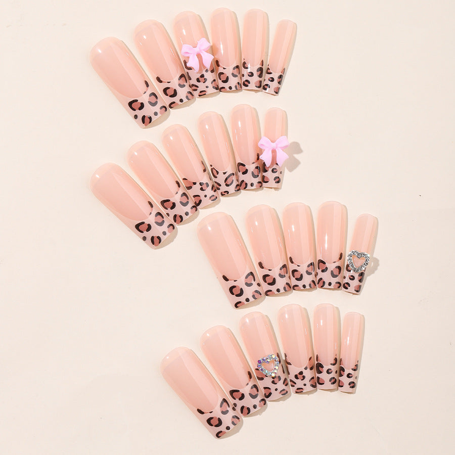 Artistic Press-On Nail Kit with Charming Leopard and Bow Designs Bowlift