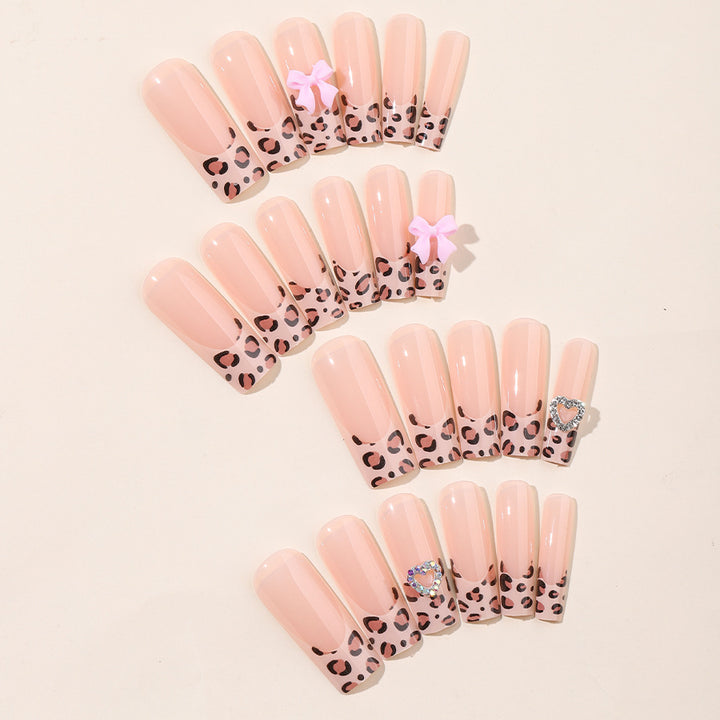 Artistic Press-On Nail Kit with Charming Leopard and Bow Designs Bowlift