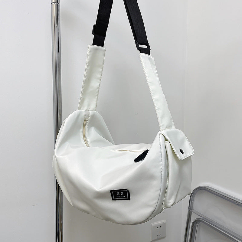 Sporty shoulder bag with adjustable carrying strap Bowlift