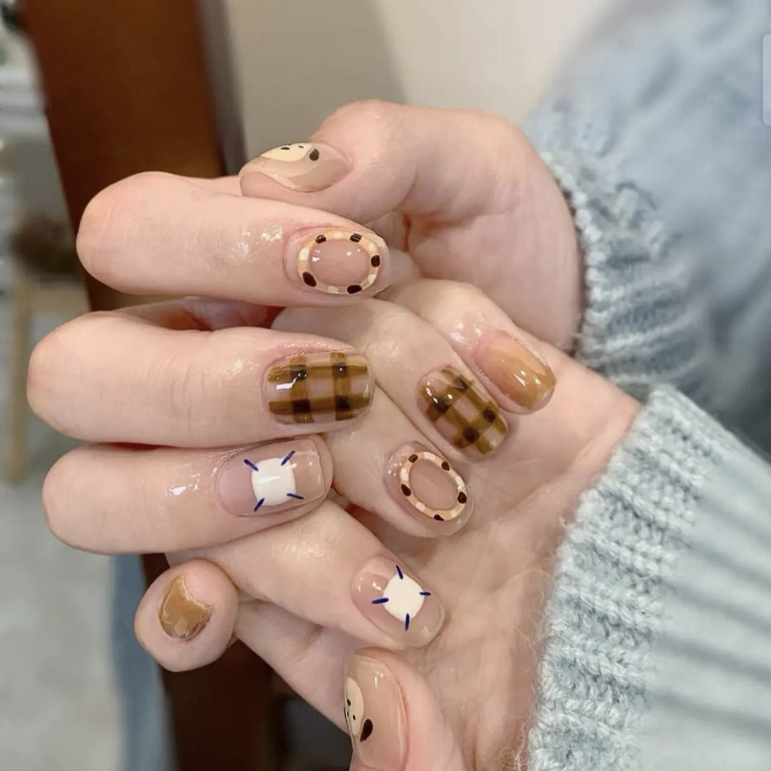 Playful artificial nails with cute animal and pattern accents Bowlift