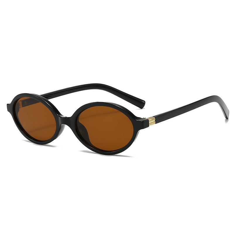 Women's fashionable oval glasses with golden accents Bowlift
