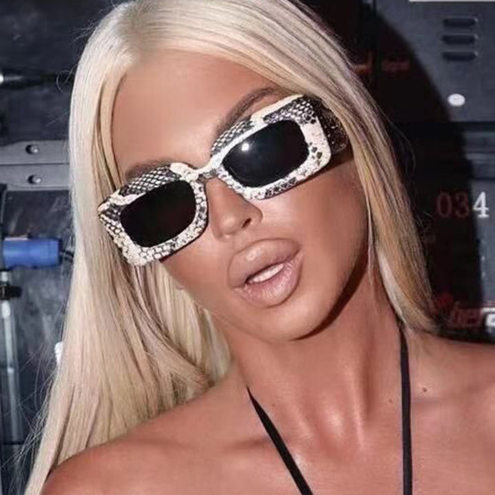 Women extravagant sunglasses with striking snake pattern Bowlift
