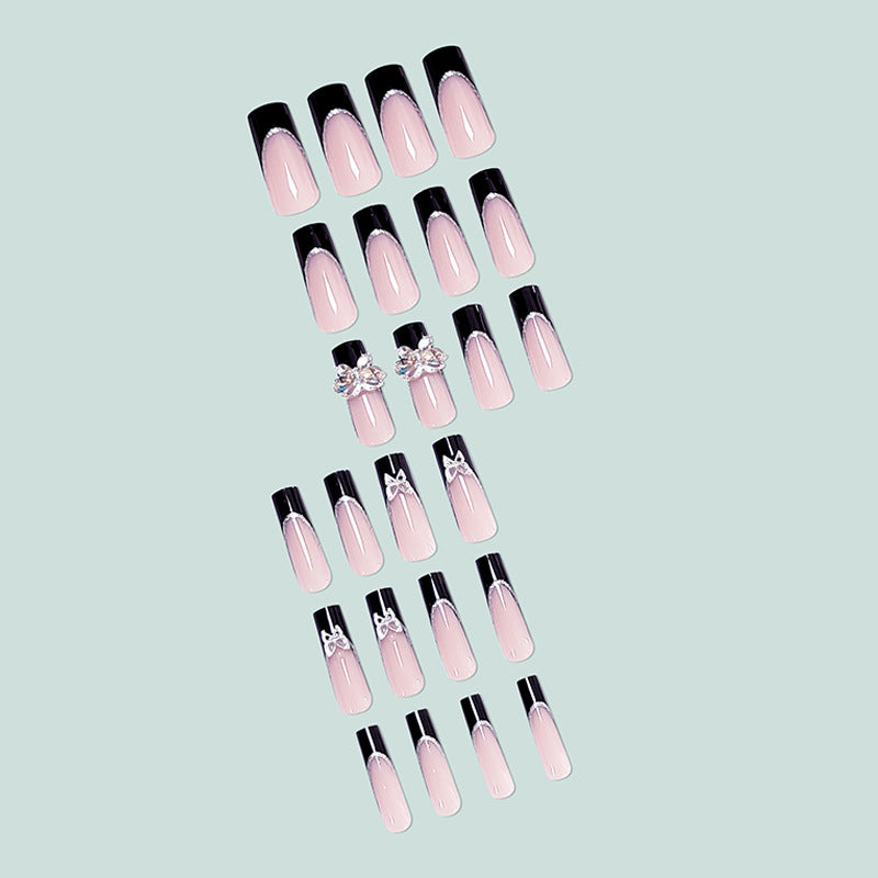 Glamorous artificial nails with rhinestone and butterfly elements Bowlift