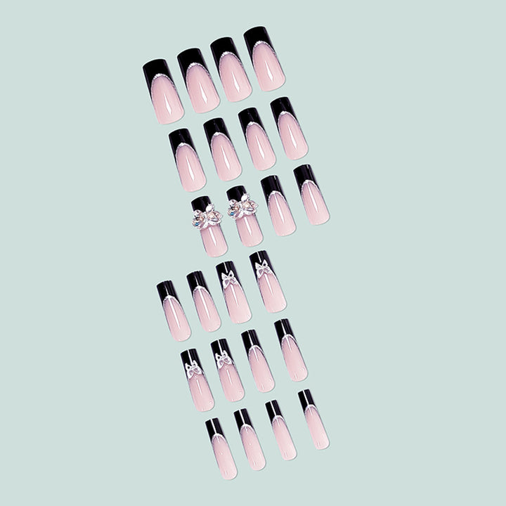 Glamorous artificial nails with rhinestone and butterfly elements Bowlift
