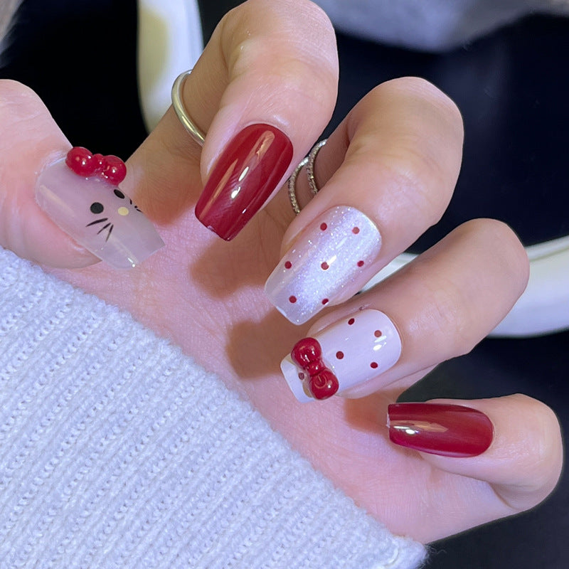 Glamorous Press-On Nail Set with Decorative Gemstone Accents Bowlift