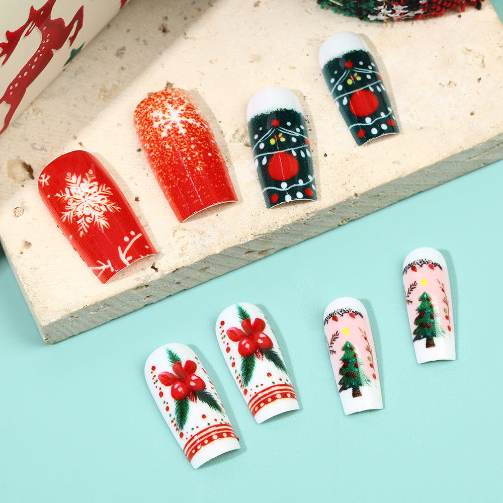 Festive artificial nails in Christmas design Bowlift