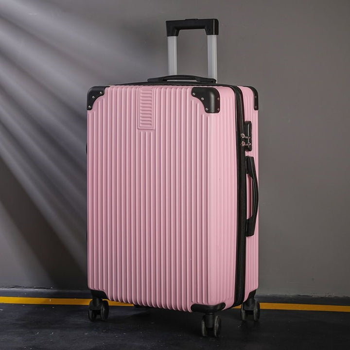 Hard shell suitcase with 360-degree wheel system and integrated safety feature Bowlift