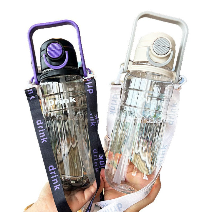 Women's large transparent drinking bottle with integrated carrying handle Bowlift