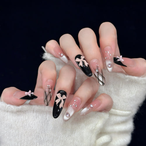 Artificial nail tips with elegant bows and glitter details Bowlift