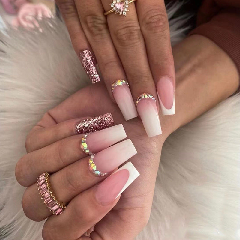 Glamorous artificial nails with rhinestone accents Bowlift