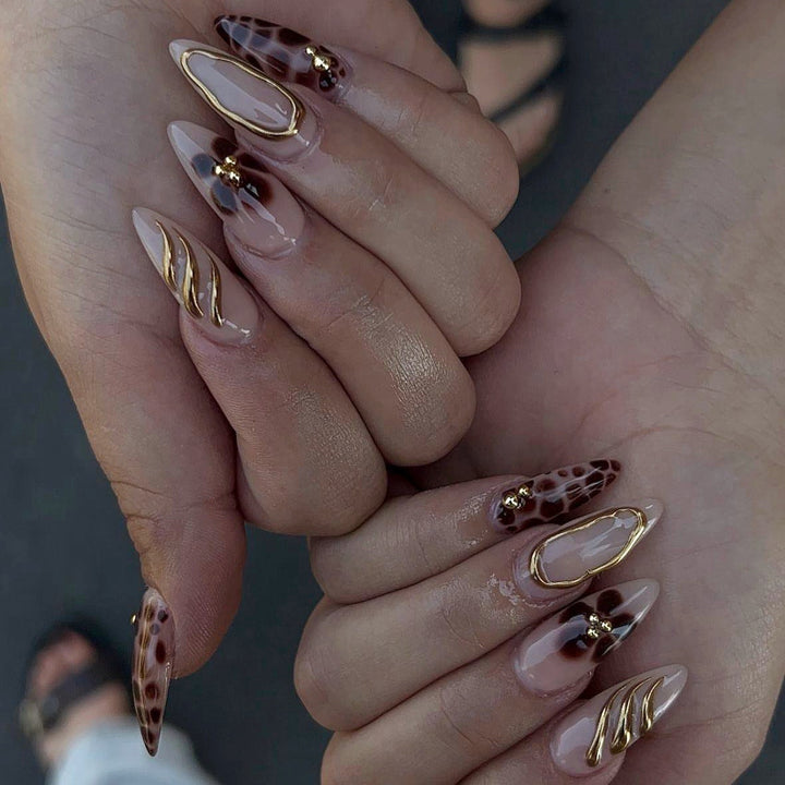 Nail art set with luxurious 3D decorations and golden accents Bowlift