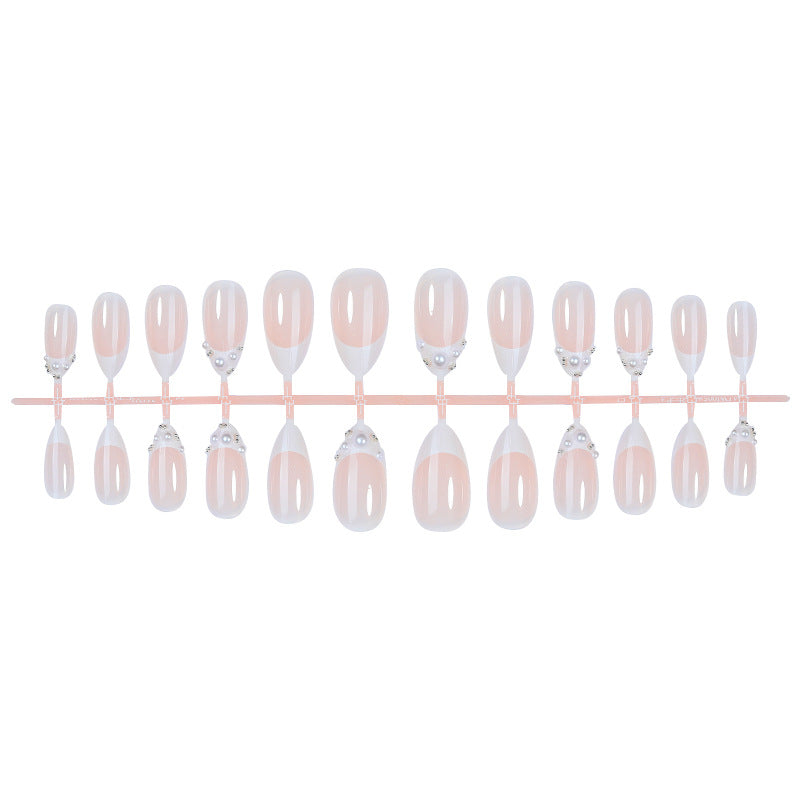 Elegant Press-On Nail Set with Pearlescent Accents Bowlift